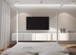 Wall Design In The Bedroom Opposite The Bed With TV