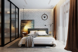 Bedroom with brick wall design photo