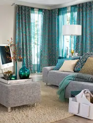 Turquoise color of curtains in the living room interior photo