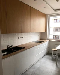 Kitchen With Wooden Countertop In Beige Interior