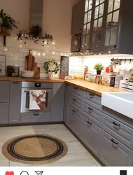 Kitchen with wooden countertop in beige interior