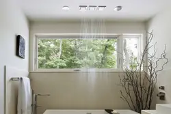 Khrushchev kitchen design with a window to the bathroom