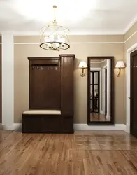 Hallway interior with brown furniture