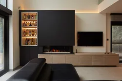 Bio-fireplace in the interior of the living room with TV