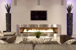 Bio-fireplace in the interior of the living room with TV