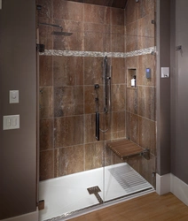 Shower cabin and bathroom made of tiles photo
