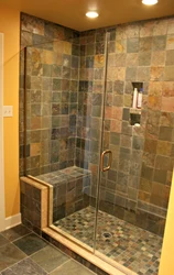 Shower Cabin And Bathroom Made Of Tiles Photo