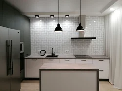 Photo Of A Kitchen Without Upper Cabinets With An Apron