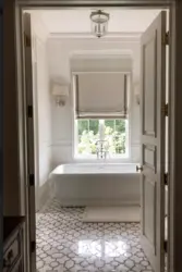 Bathtub opposite the door photo