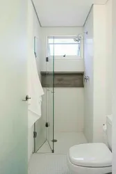 Design Of A Narrow Bathroom With Toilet And Shower