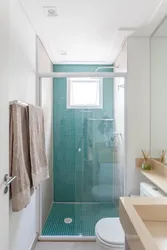 Design of a narrow bathroom with toilet and shower