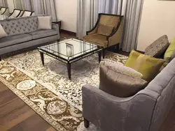 Красивые ковры в интерьере гостиной фото