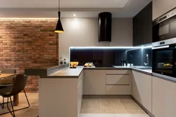 U-shaped kitchen design with breakfast bar