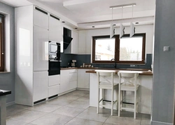 U-shaped kitchen design with breakfast bar