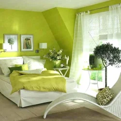 Photo of a bedroom with green walls