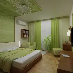 Photo of a bedroom with green walls
