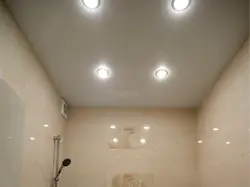 Photo of a stretch ceiling in a small bathroom
