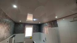 Photo of a stretch ceiling in a small bathroom