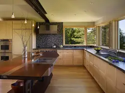 Kitchen interior with a large window in the house
