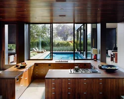 Kitchen interior with a large window in the house