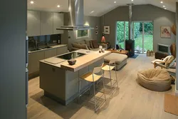 Living room kitchen design with island and sofa