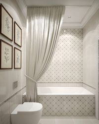 Photo of a bathroom with tiles, modern design in light colors