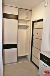Photo Of A Modern Small Hallway Wardrobe