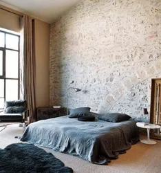 Bedroom With Decorative Plaster On The Walls In The Interior