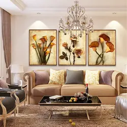 Картины в интерьере гостиной над диваном в современном стиле