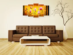 Paintings in the living room interior above the sofa in a modern style