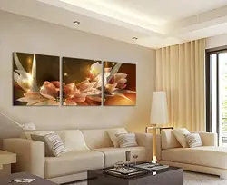 Paintings in the living room interior above the sofa in a modern style