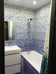 Small bathtub with mosaic design photo