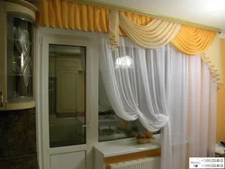 Curtains in the kitchen on a large window photo