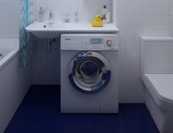 Фота ракавіны над пральнай машынкай у ванны пакой