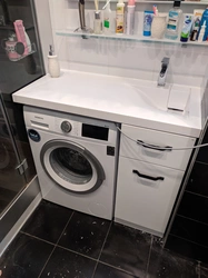 Photo of the sink above the washing machine in the bathroom