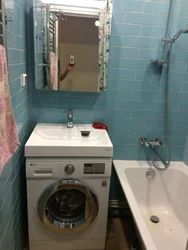 Photo Of The Sink Above The Washing Machine In The Bathroom