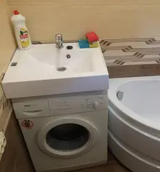 Photo of the sink above the washing machine in the bathroom