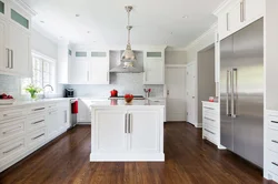 Interior white kitchen dark floor