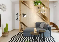 Wooden slats in the interior on the wall in the living room