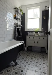 Bath Design With Dark Tiles On The Floor