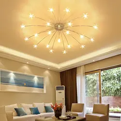Suspended ceiling with spotlights and chandelier in the living room photo