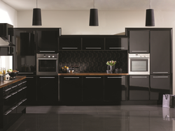 Black appliances in the kitchen interior photo