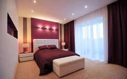 Photo of a bedroom in burgundy tones photo