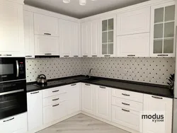 Kitchens with white countertops and white sink photo