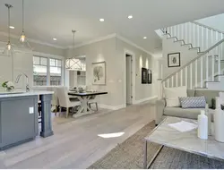 Gray kitchens in the interior combined with a living room