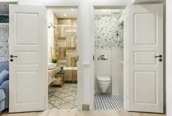 Doors To The Bathroom And Toilet In The Interior Photo