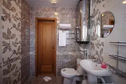 Doors To The Bathroom And Toilet In The Interior Photo