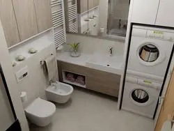Modern Design Of A Bathroom Combined With A Bathtub And Washing Machine