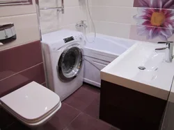 Ванная комната с раковиной унитазом и стиральной машиной фото