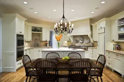 Photo of a kitchen in a house with a chandelier